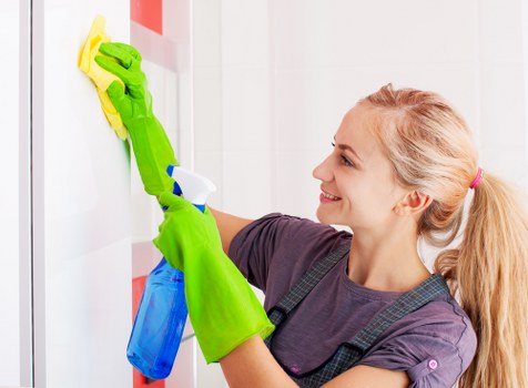 Professional cleaners working in a Brixton home interior