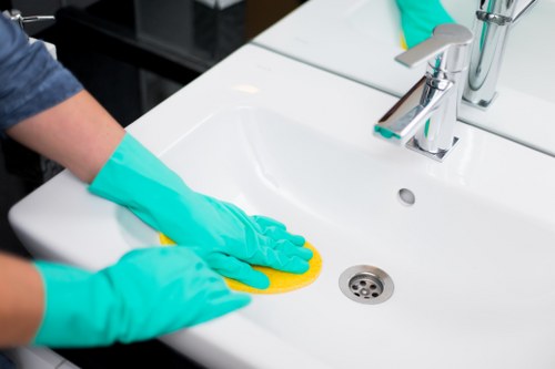 Manager discussing a service issue with a cleaning team member