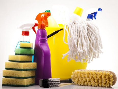 Professional cleaner tackling bathroom deep cleaning in Brixton